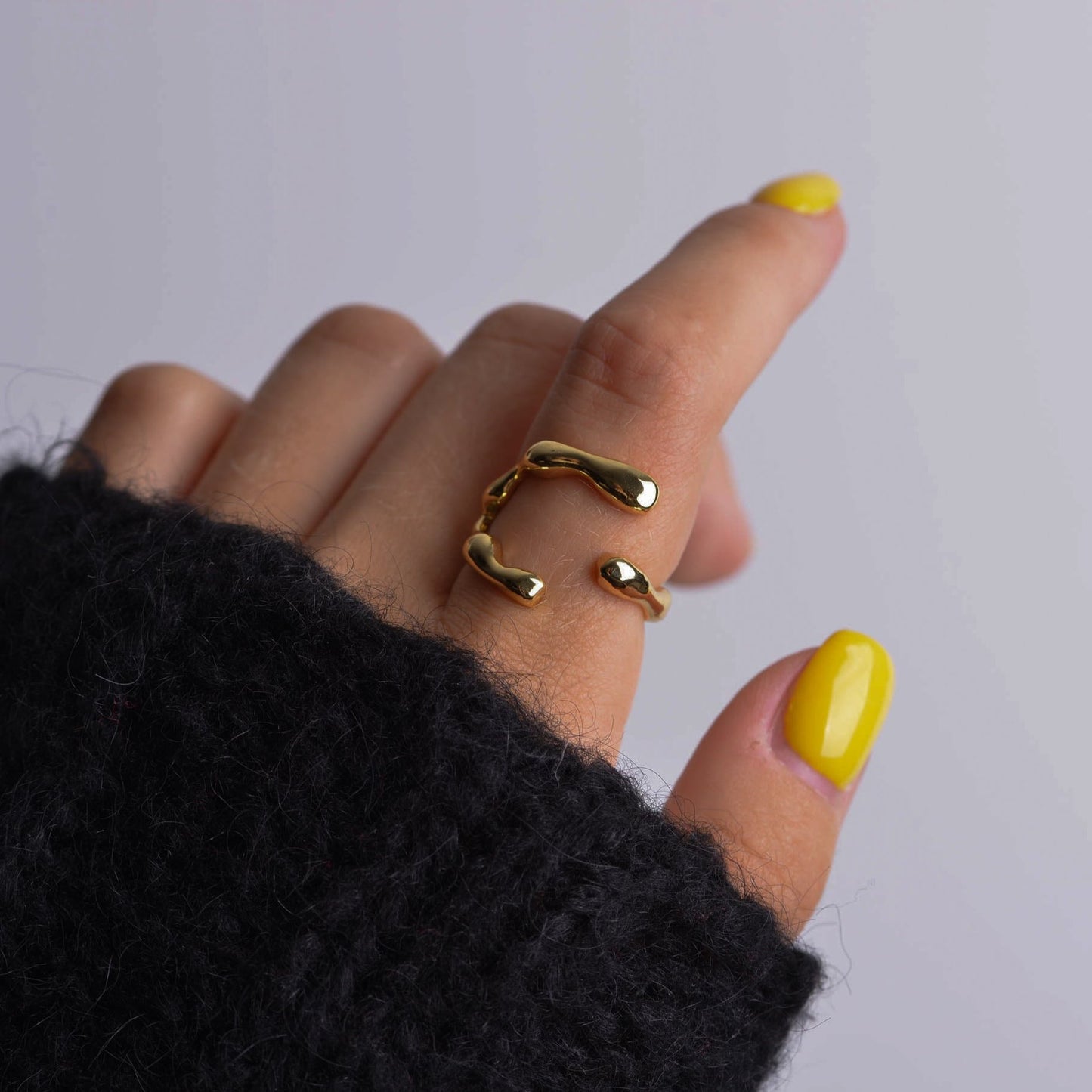 Irregular silver and gold rings