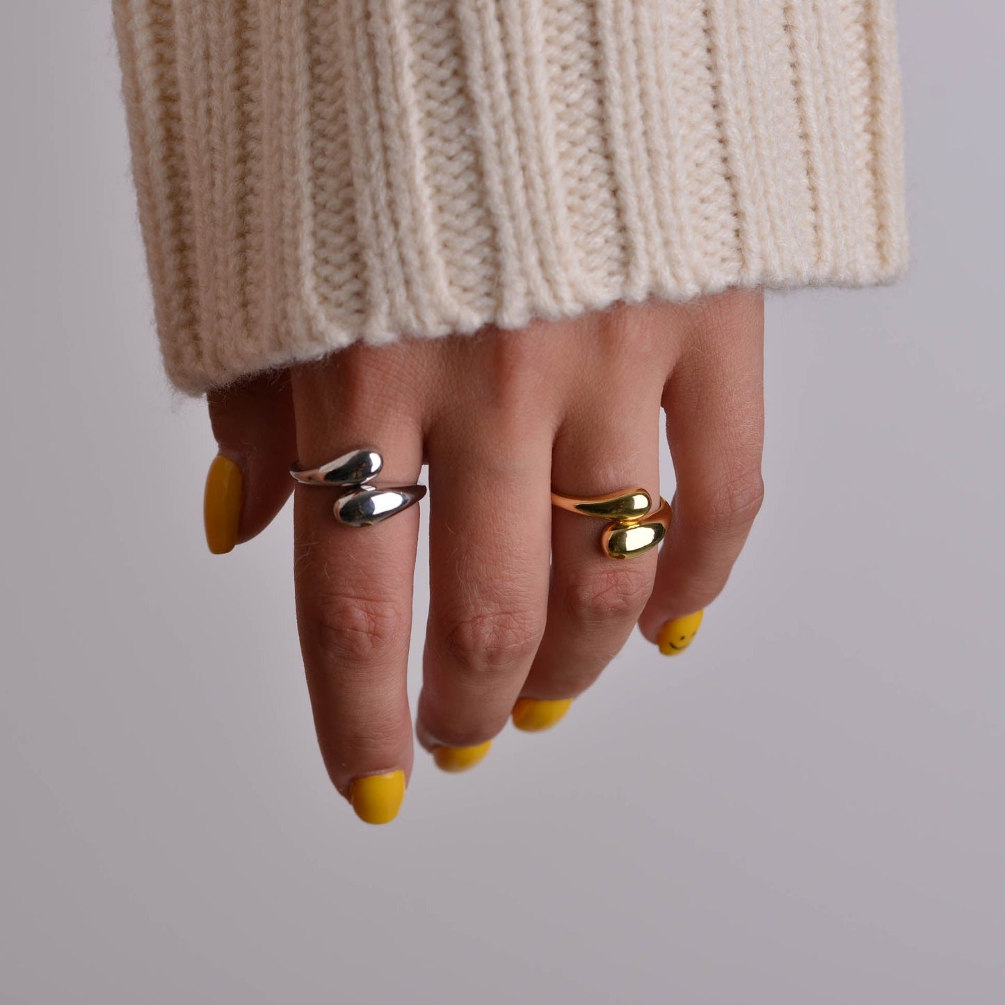 Twisted Drop Silver and Gold Rings