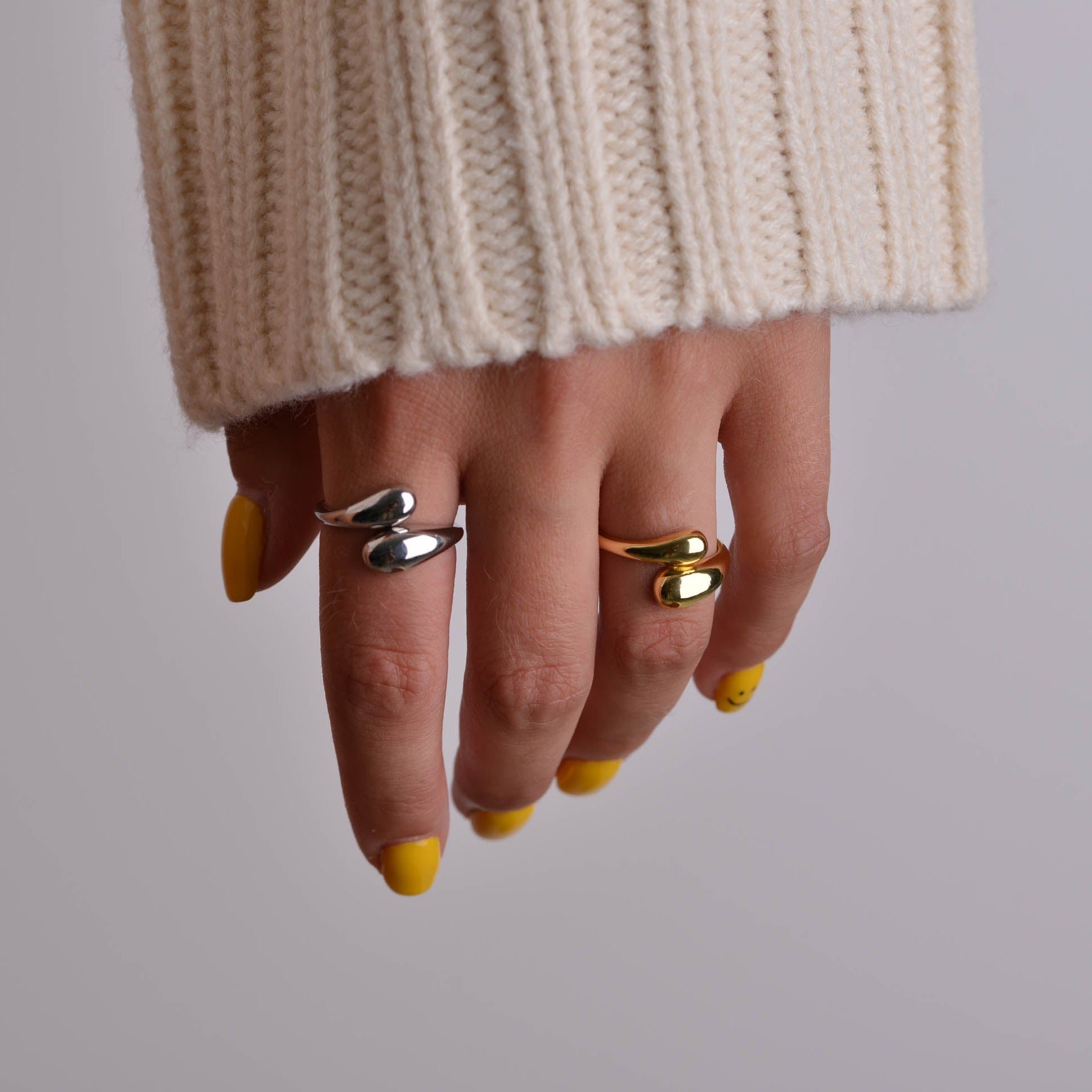Twisted Drop Silver and Gold Rings