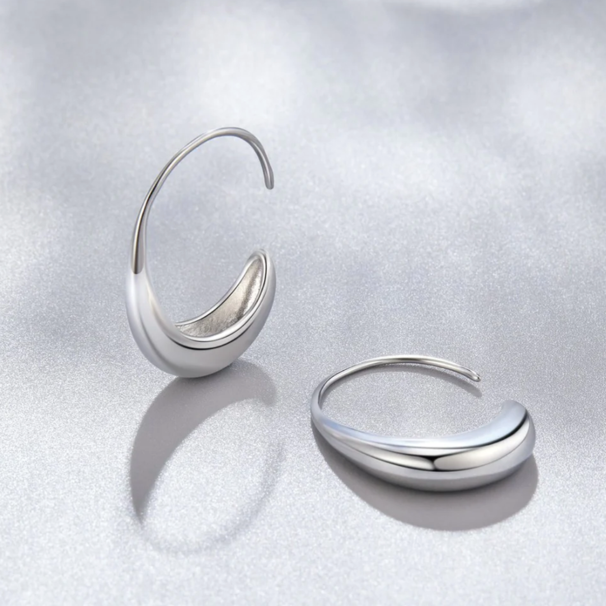 Large C form gold hoops for women