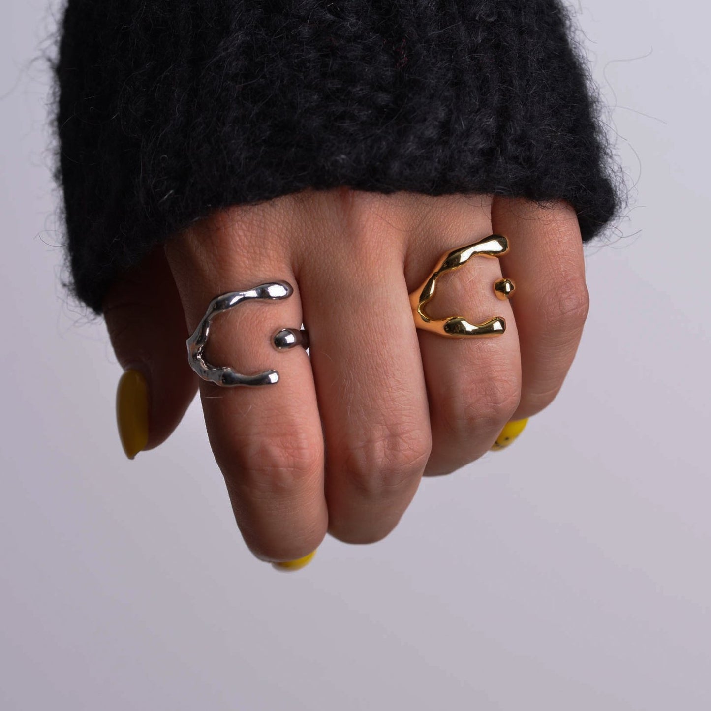 Irregular silver and gold rings