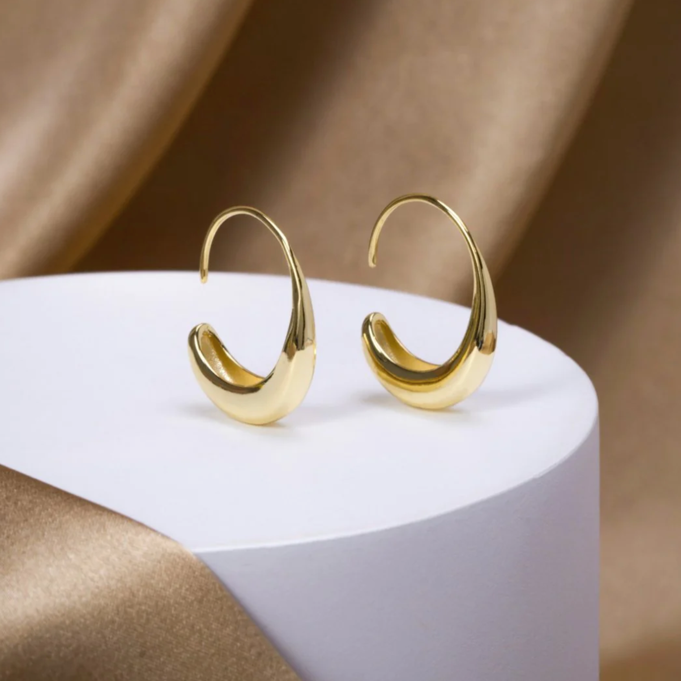 Large C form gold hoops for women